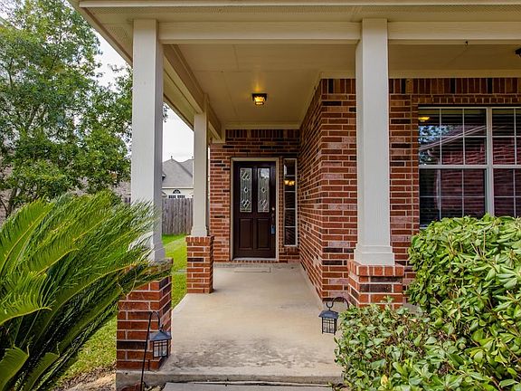 The leaded glass front door will welcome your guests into the home.