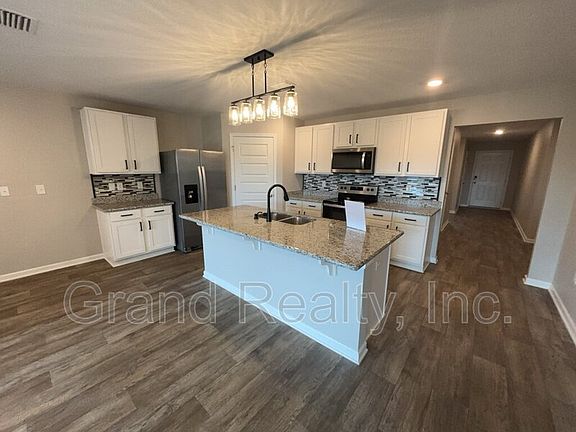 3rd image of 5583 Guinevere Ln