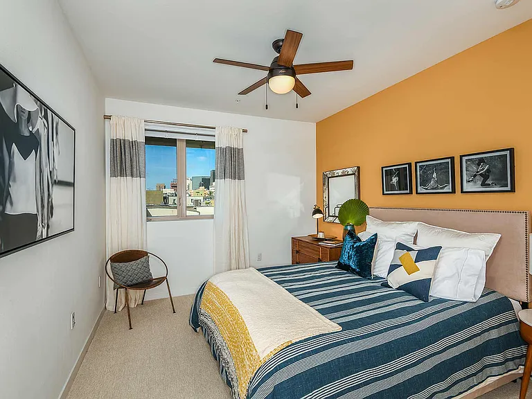 Spacious Bedroom with a Ceiling Fan