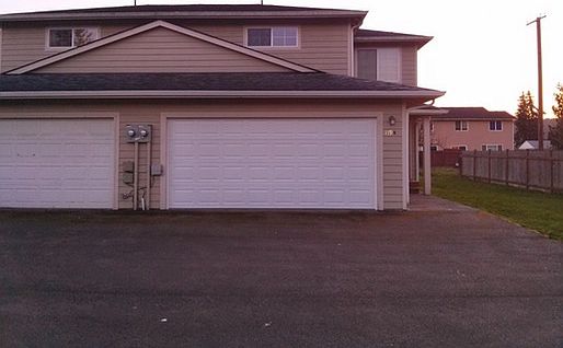 Front view of Duplex. We are set back from the street so it