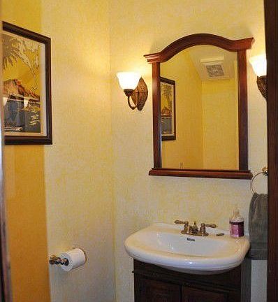 Just off the entry you will find this charming guest bath.