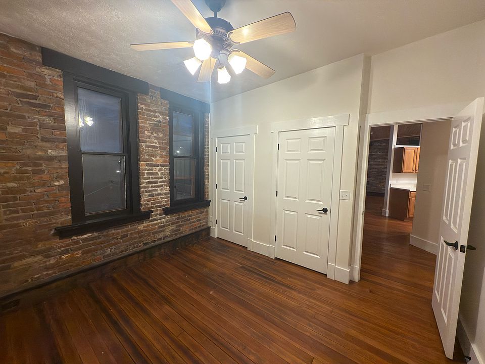 Bedroom 1 with his and hers closets