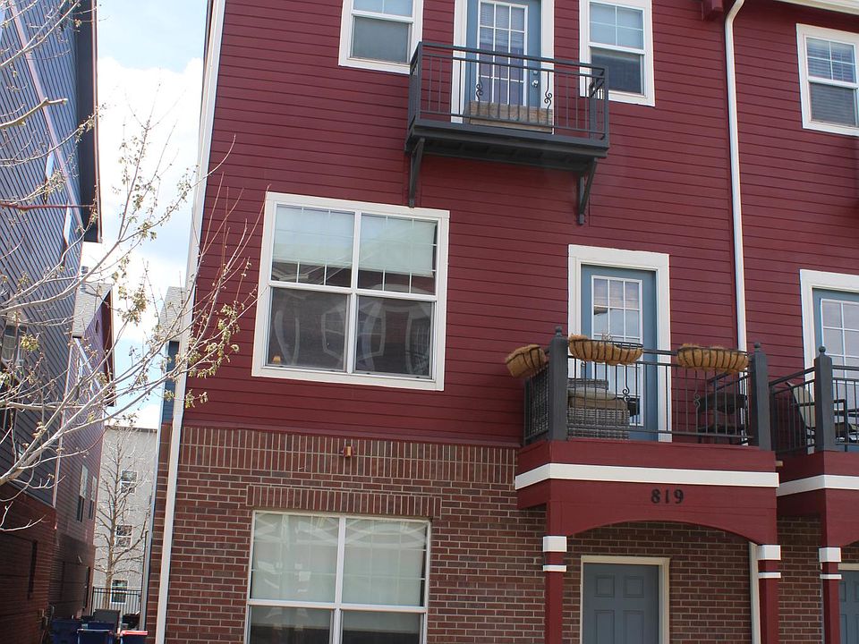Front of the home. Grassed, pet friendly area available here. End unit with walkway to rear of condo (pictured to the left).