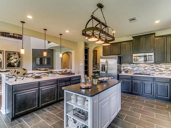 Kitchen with under cabinet lighting.