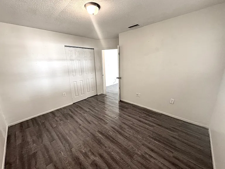 Interior photos are of a neighboring unit with identical floor plan. Paint color is the same, but the flooring is actually ceramic tile.