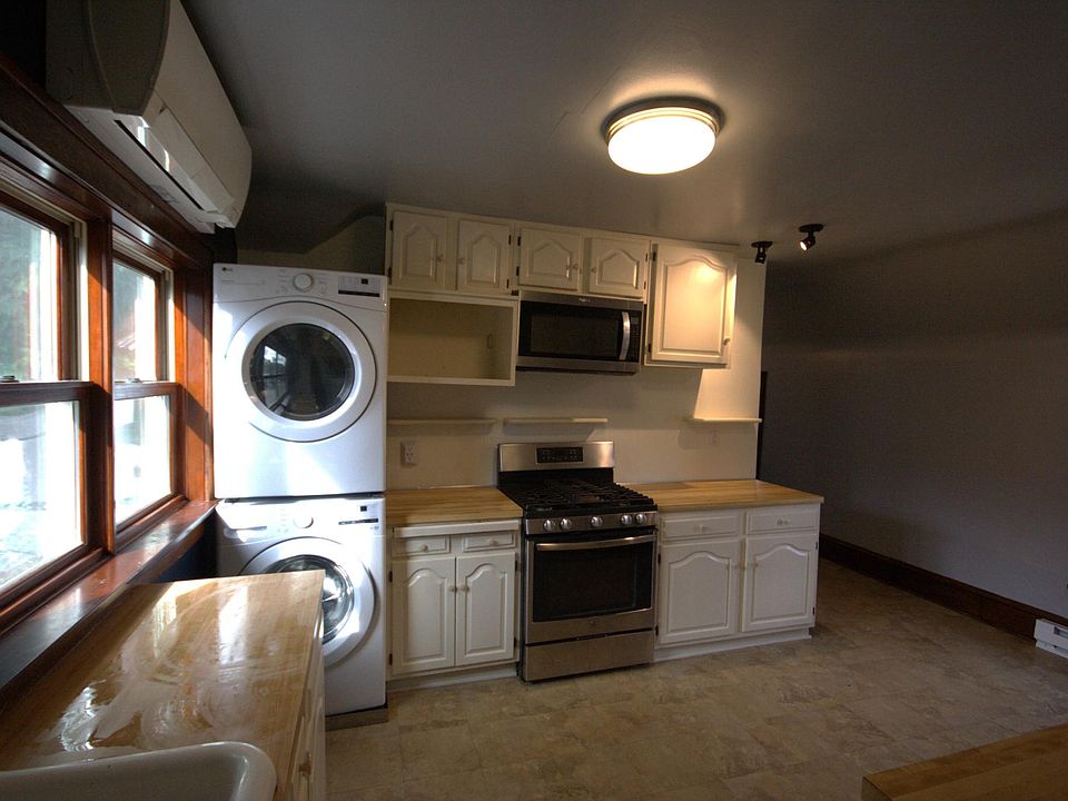 Large Kitchen with dishwasher. New washer, dryer and gas stove.