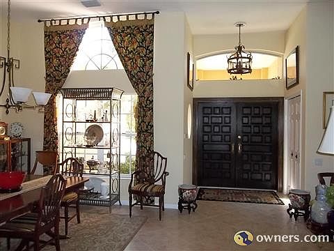 Entry doors are solid raised panel oak with  brass hardware