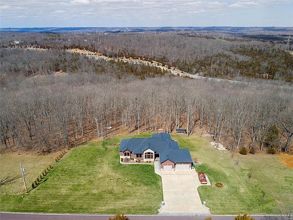 Beautiful 5+ acre lot has room for more!