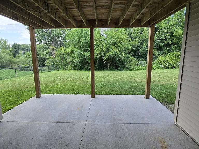 Walk-out patio area under covered deck