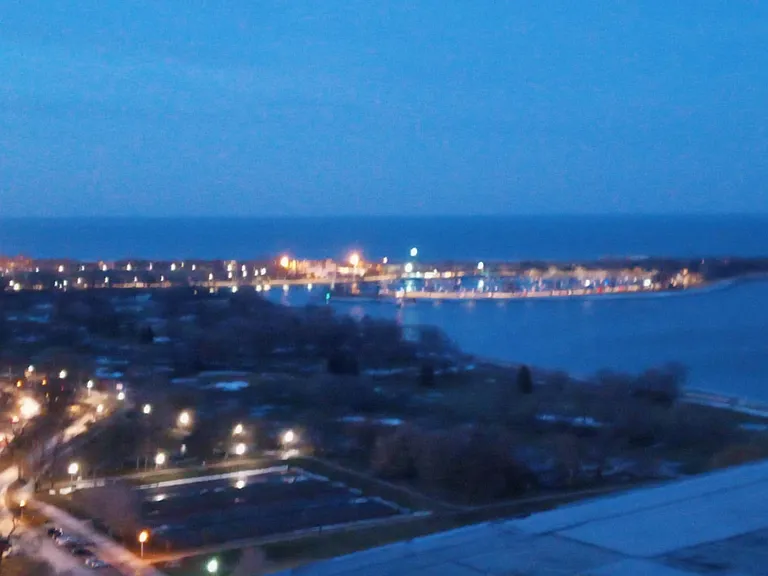 Rooftop view north of Montrose Harbor at dusk