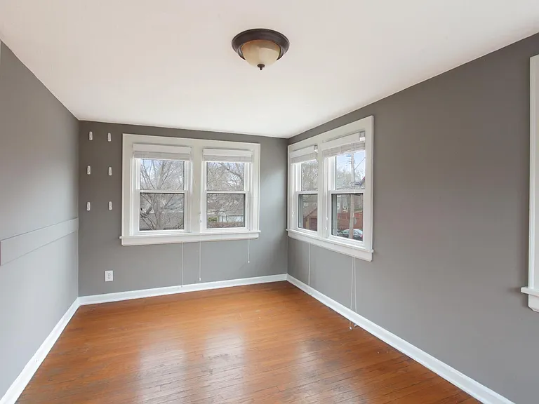 437 E 70th Ter — Photo 12