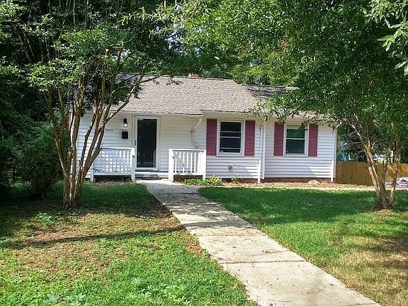 Curb view, private driveway to the right of the picture.