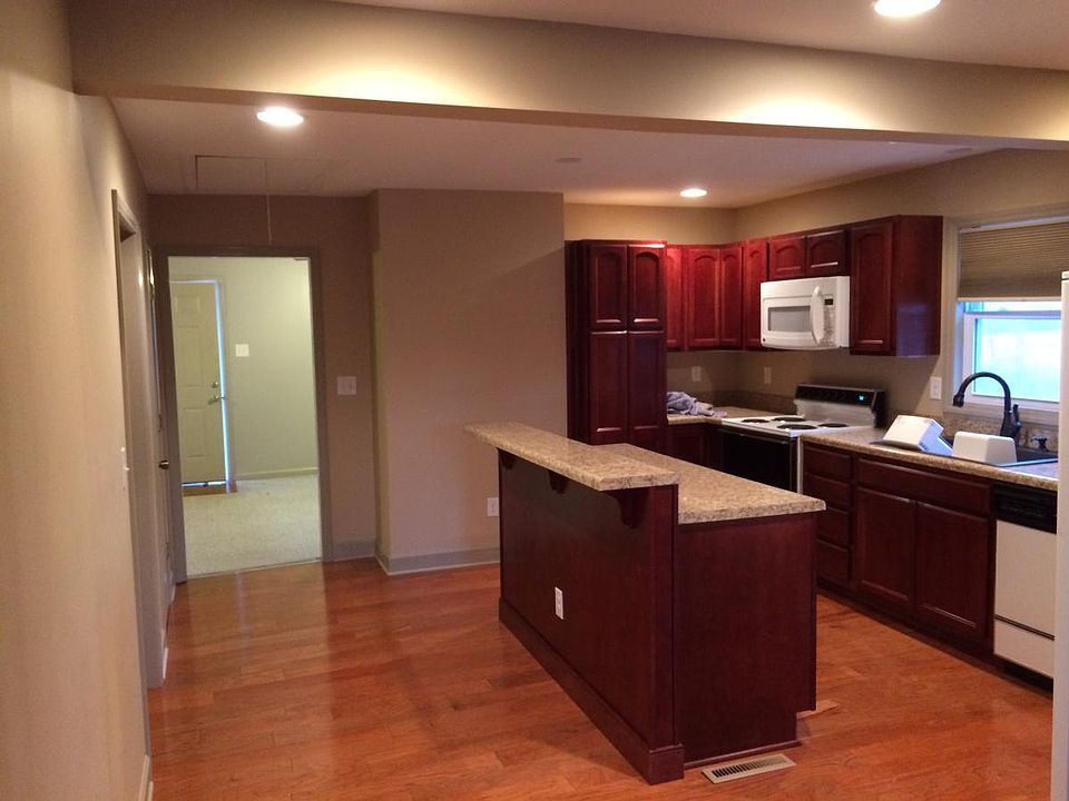 Remodeled kitchen with island bar