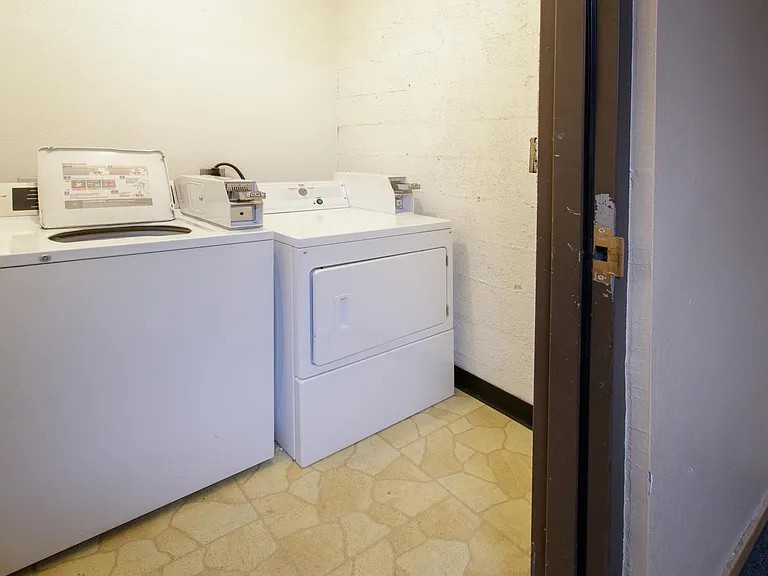 Complex laundry - There is also a private W/D in the condo in the closet off the hallway