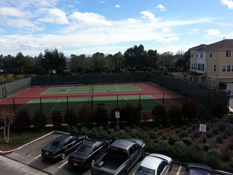 Tennis courts behind unit