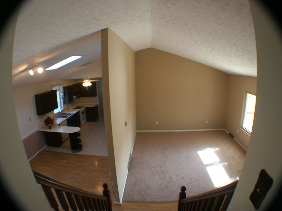 Newly Neutralized Kitchen with new lighting and paint!