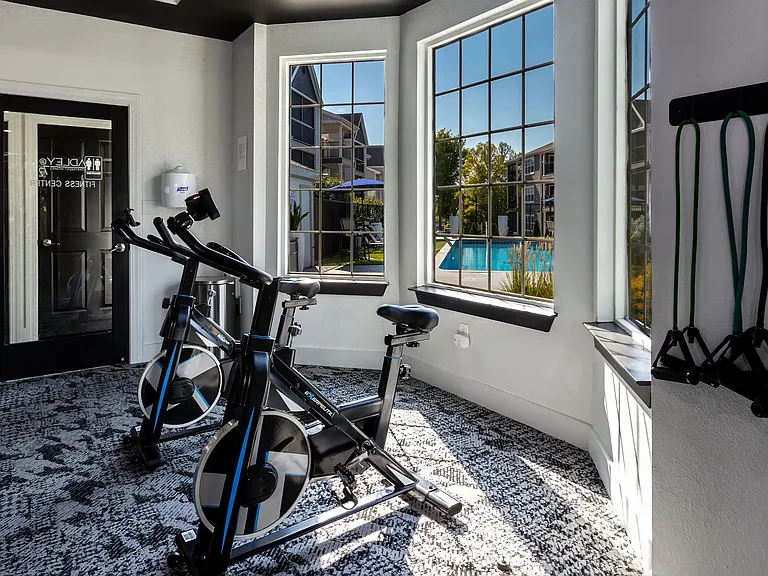 Our fitness center features state-of-the-art equipment including spinning bikes.