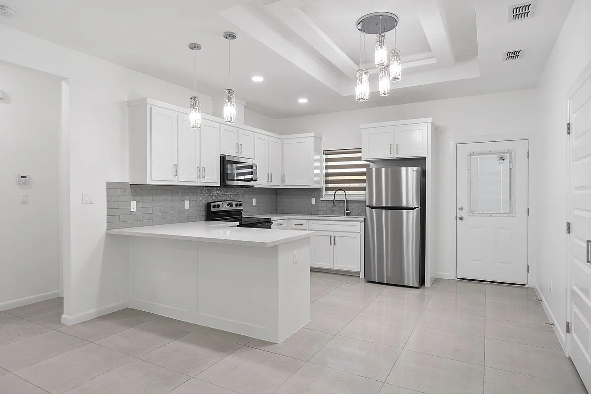 Building Photo - 3508 S Dominique Dr #1