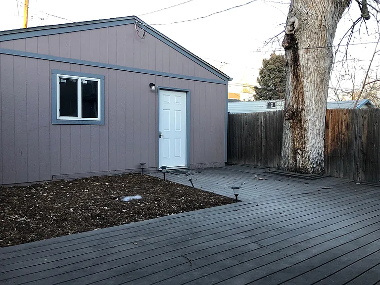 Zero maintenance backyard. Fully fenced. Mulch has been replaced w artificial turf. Although it is a 2 car garage, 1 spot is leased separately. That is negotiable.