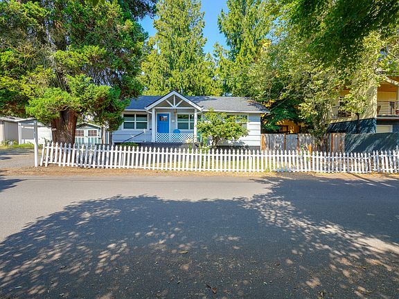Fenced Front Yard with extra parking on the left and right and side and back yard access