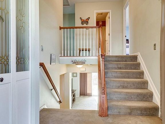 View from entryway (bedrooms upstairs, kitchen/dining/living rooms downstairs)