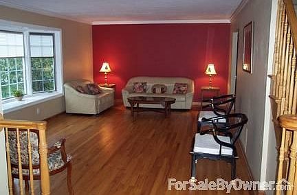 Living Room : Hardwood floors, bay window.