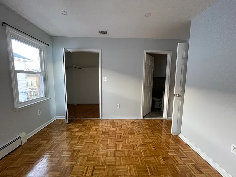 View of walk in closet and private bathroom in the Master bedroom