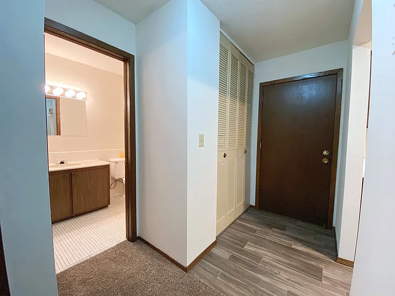 Entry, entry closet and bathroom