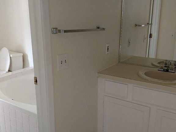 Master Bath, toilet and guest sink
