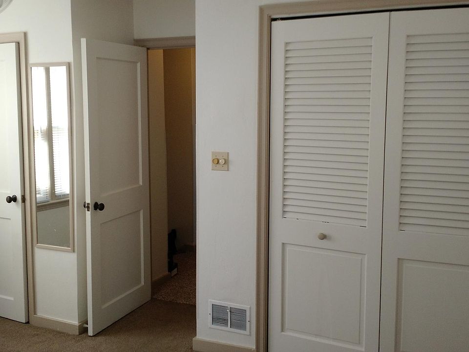 Bedroom closets (and hall door in the middle)
