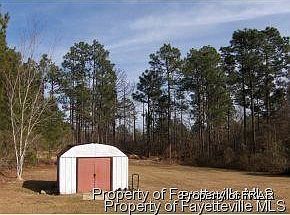 Back yard. Storage building has been replaced brand new sinc
