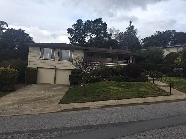 2 car garage plus extra parking in Belmont