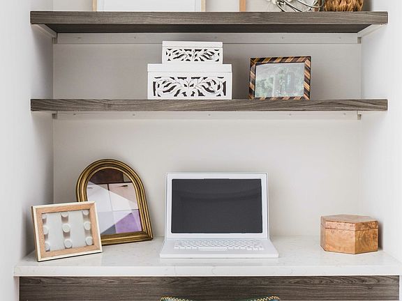 Built in desk space - perfect for your home office.
