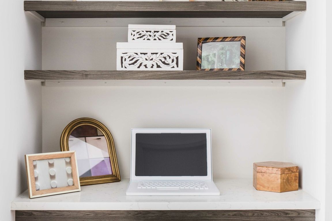 Built in desk space - perfect for your home office.