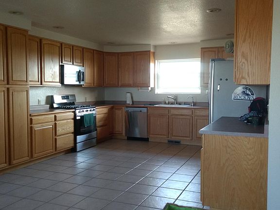 Huge kitchen, new condition appliances, lots of storage.