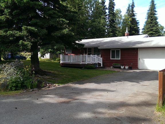 Large paved driveway, garage