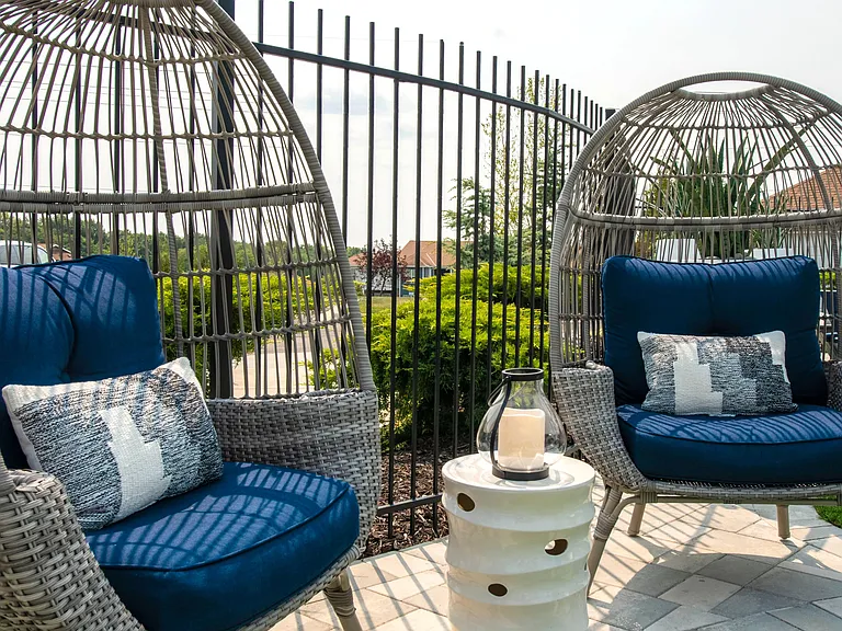 Discover sleek poolside seating for residents to unwind and enjoy the outdoor lounge area, combining comfort and elegance.