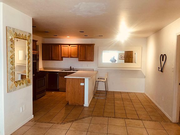 Open, bright living room/kitchen