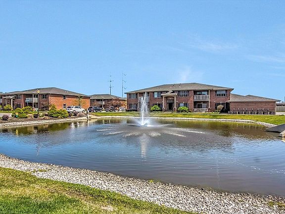 POND VIEW CONDO UNIT IN THE BACKGROUND STRAIGHT AHEAD