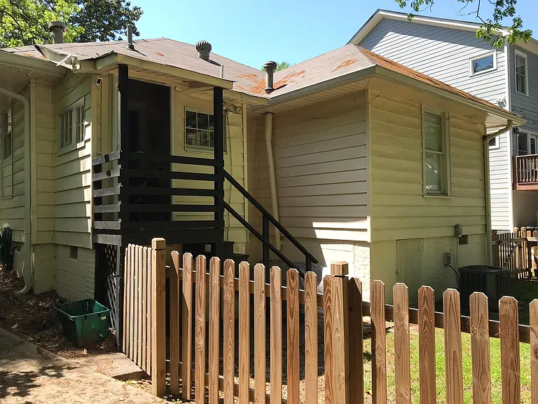 Rear stairs from utility/mudroom to backyard