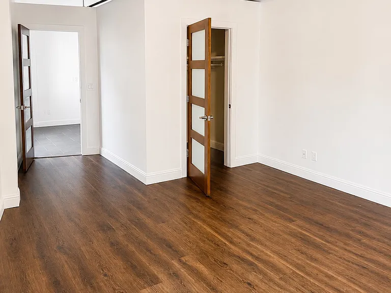 Guest bedroom featuring excellent natural light and flexible layout.