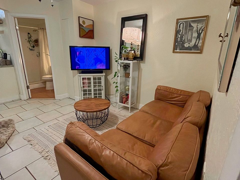 Living room with small linen closet