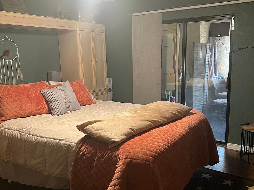 Master bedroom with patio access.