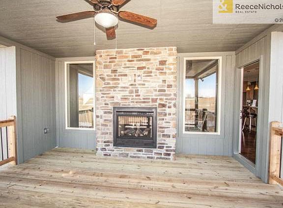 SEE THROUGH FIREPLACE TO COVERED DECK