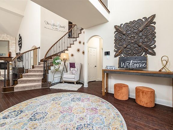 Additional view of foyer and spiral staircase