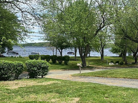 View from Kitchen and living room. Park directly across the street with beach, boat ramp
