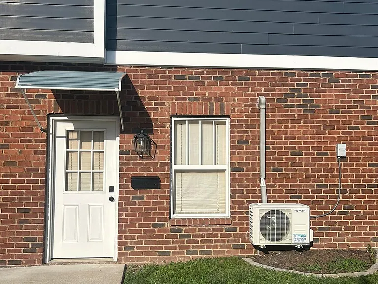 Here is an outside view of your private entrance. The unit also includes a dedicated parking space.