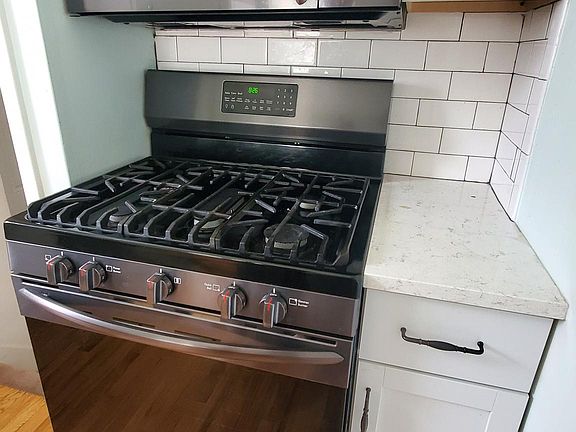 Kitchen (new stove/otr microwave)
