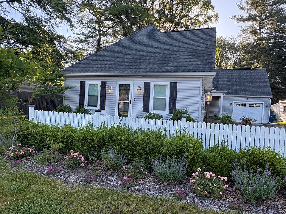 This over 1900 sqft. colonial cottage is nestled among mature trees with beautifully landscaped grounds.
