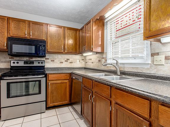 Self cleaning oven, built in microwave, dishwasher, stainless